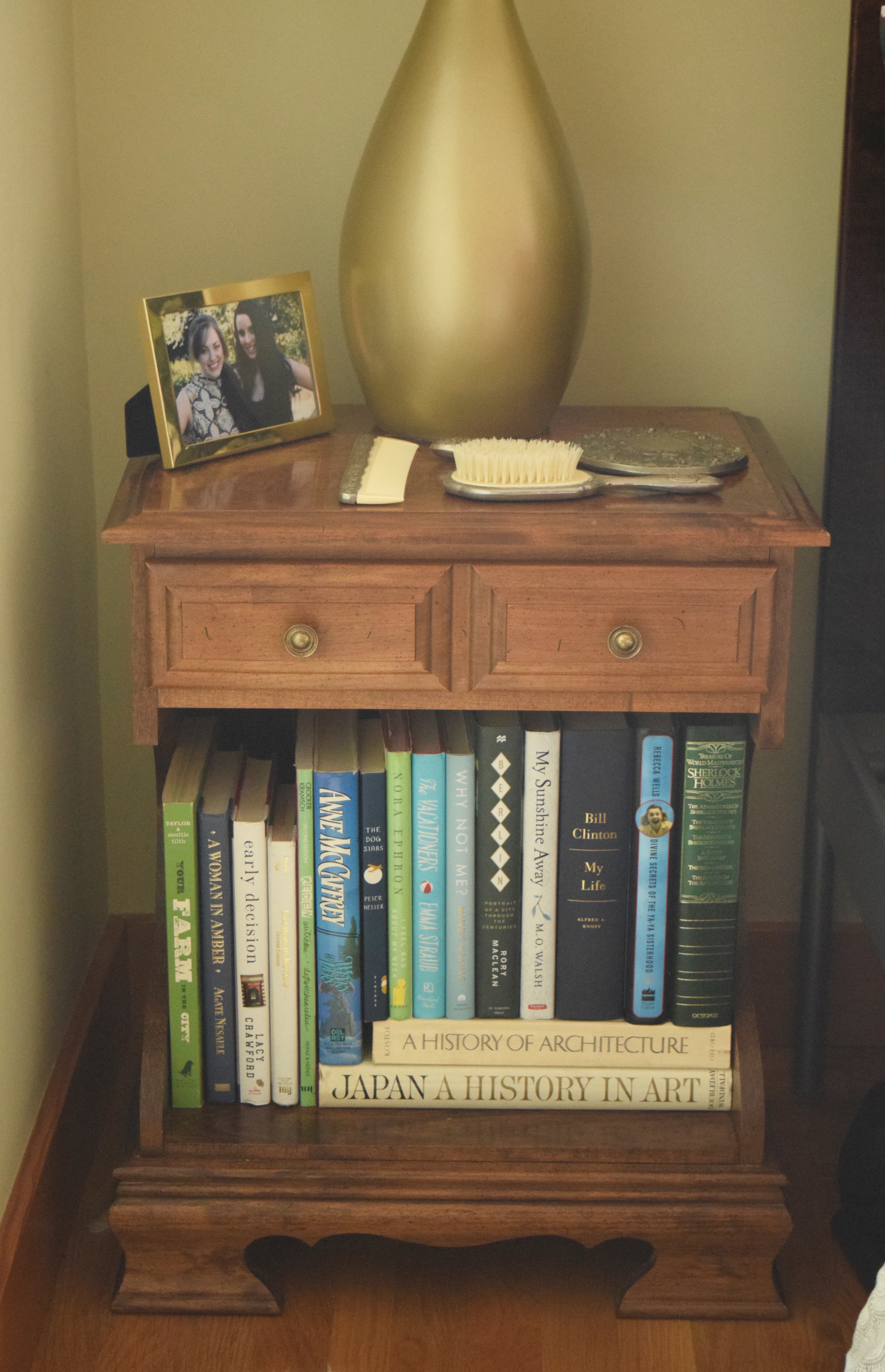 Nightstand with Green Books | Land of Laurel